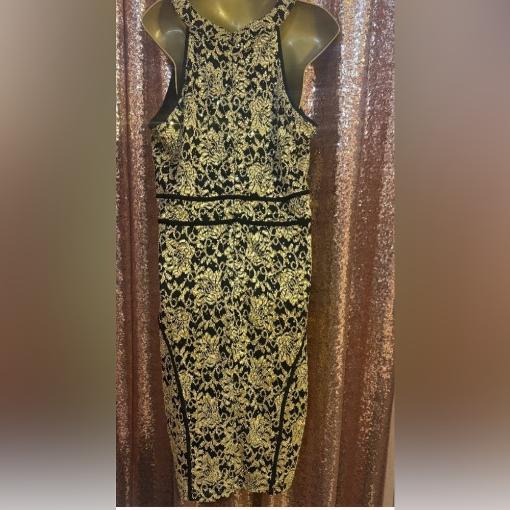 Elegant Black and Gold Party Dress.  Stretch fit.   Size 22W

FREE SHIPPING
